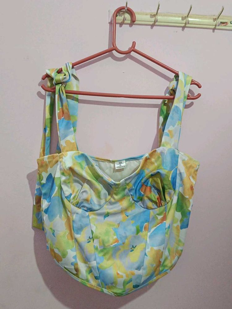 This is a multi color light weight corset top