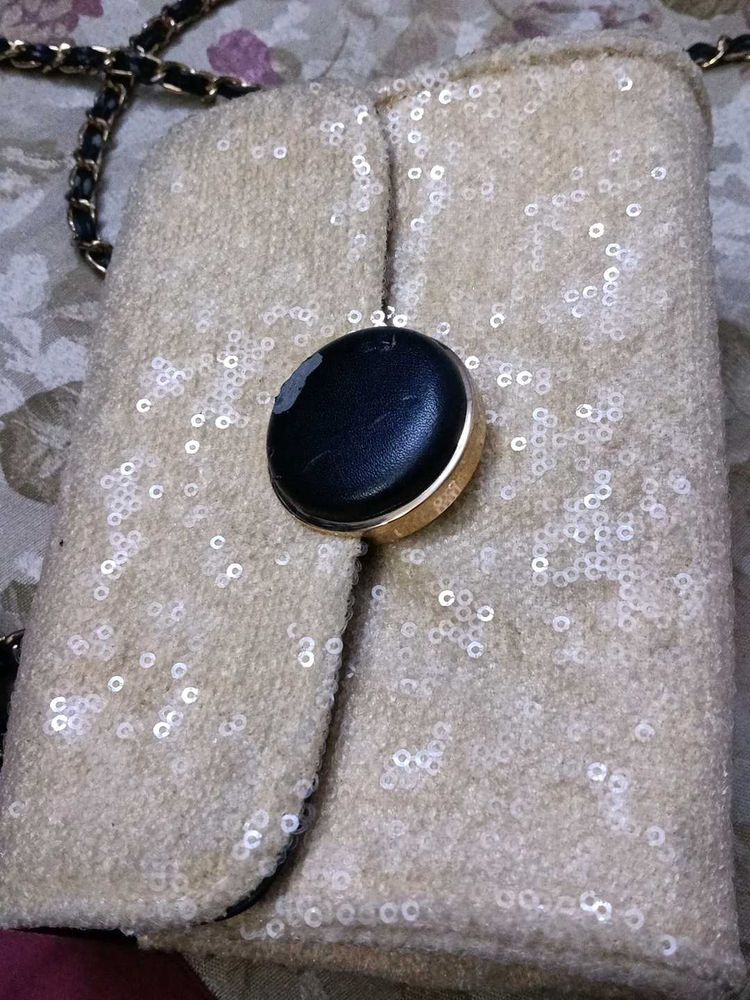 Sparkly sling handbag