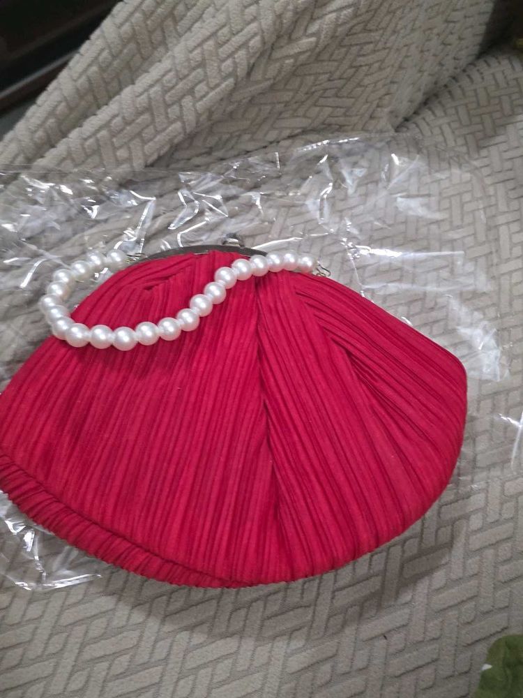 Red Potli Clutch With Pearl Handle - medium