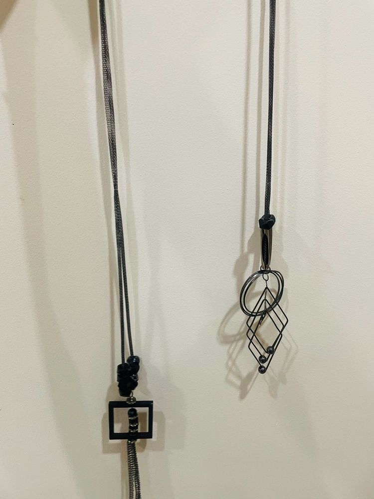 Transform any outfit with our geometric pendant