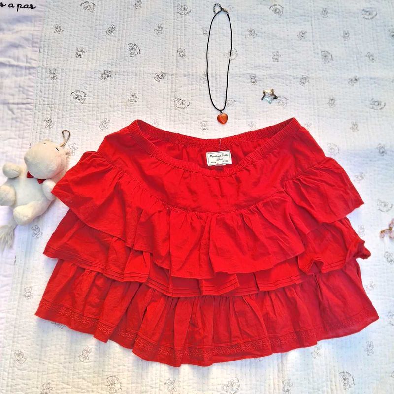 red ruffled short skirt