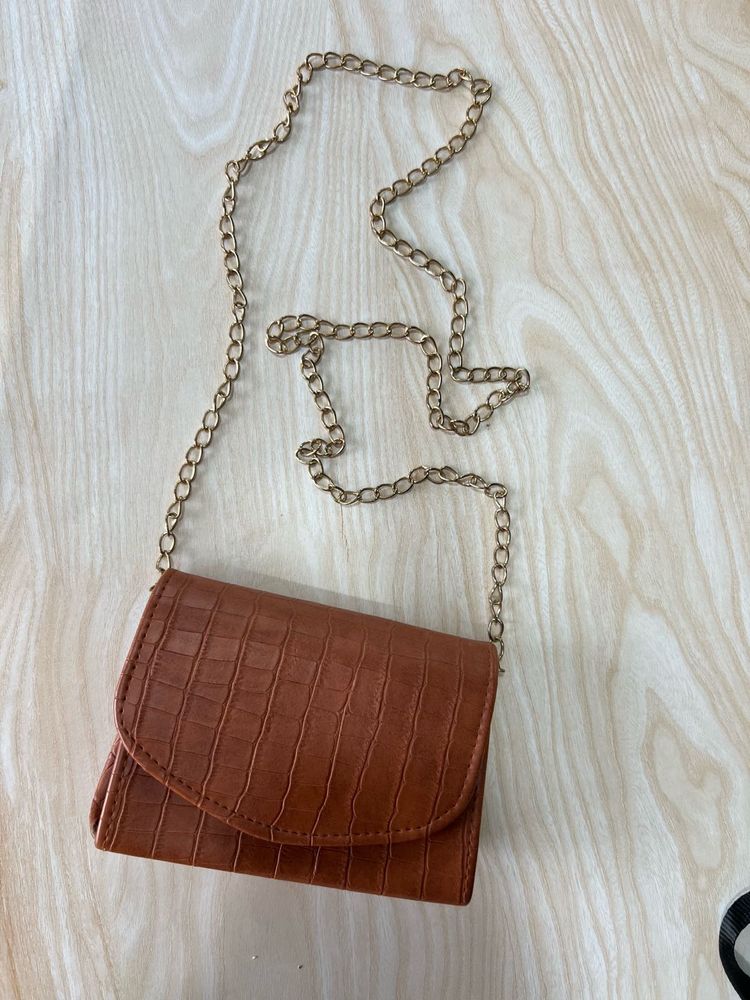 2 (brown/black) sling Crossbody Bag