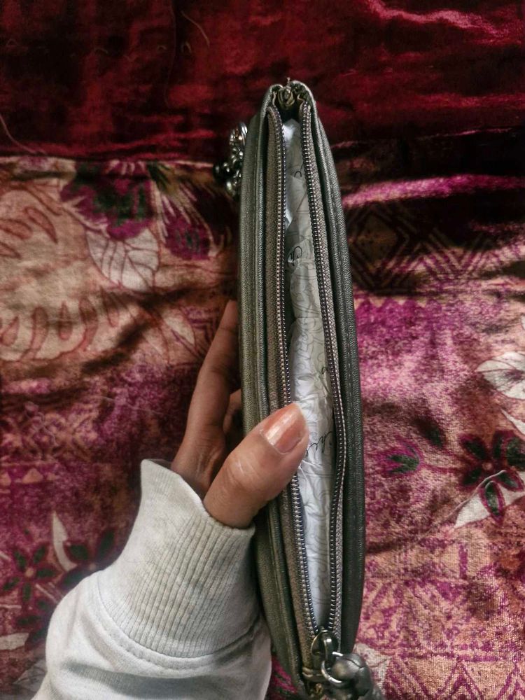 Woven Metallic Silver Clutch