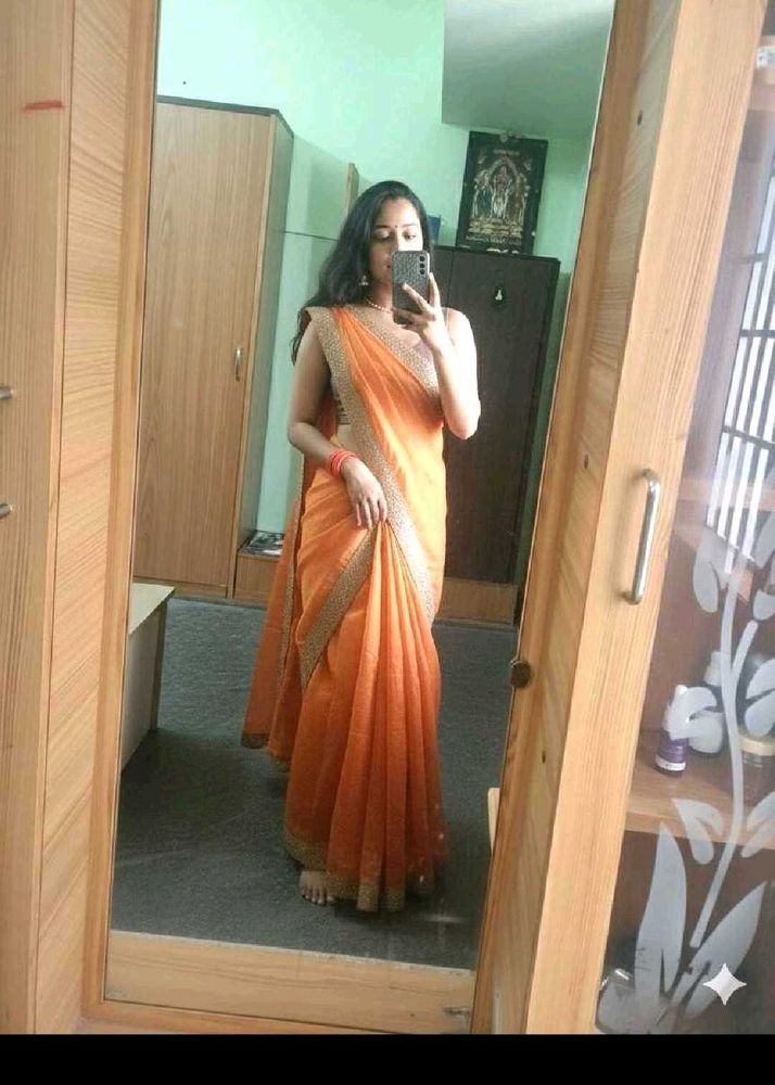 Elegant Orange,green, teal blue Saree