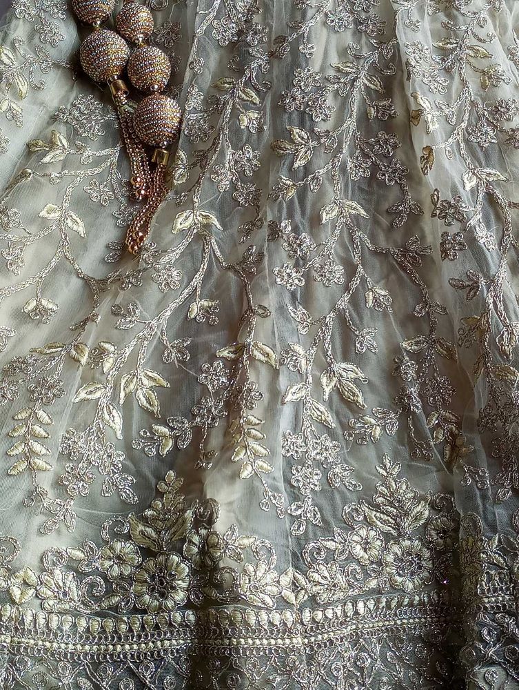 Lahenga Choli With Dupatta And Latkan Attached