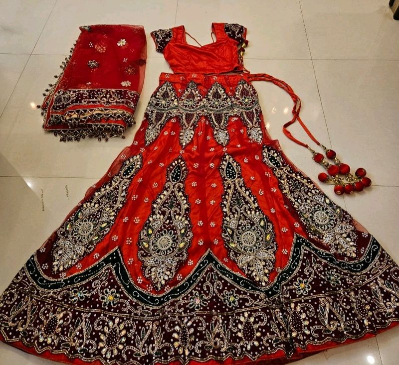 Red Wedding lehanga with stud work on Dupatta