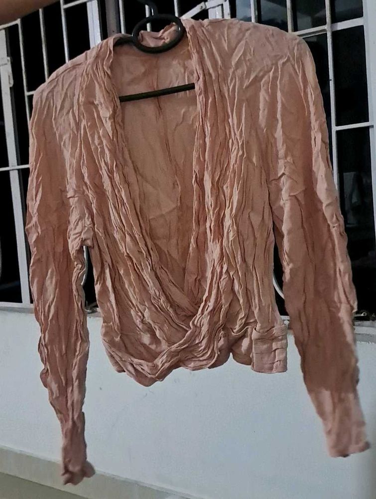 wrap style light pink blouse