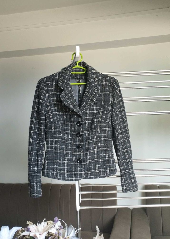 Black striped long sleeve blazer.