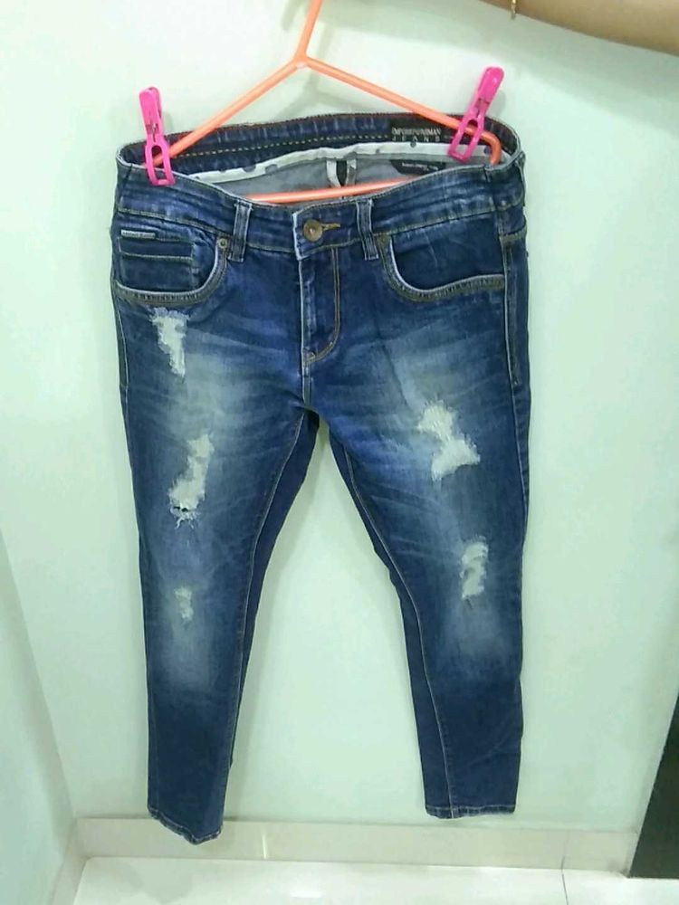 Distressed Denim Jeans