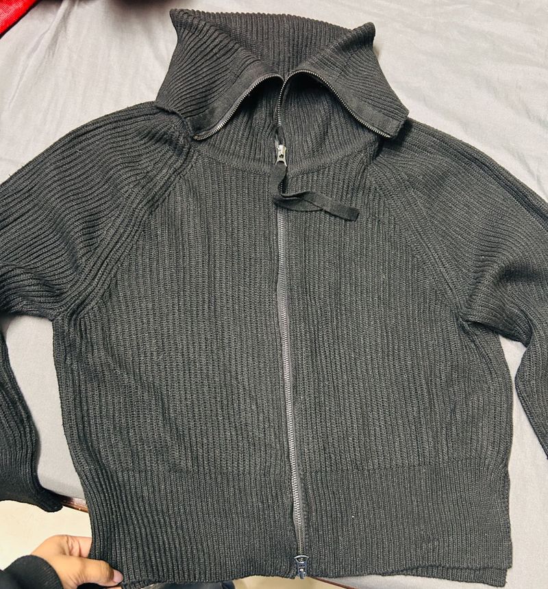 Black Knit Zip-Up Jacket with a high collar. (M/L)