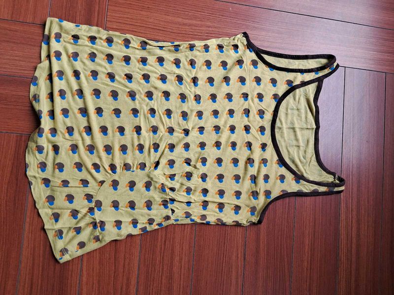 14) Patterned Sleeveless Reebok Top