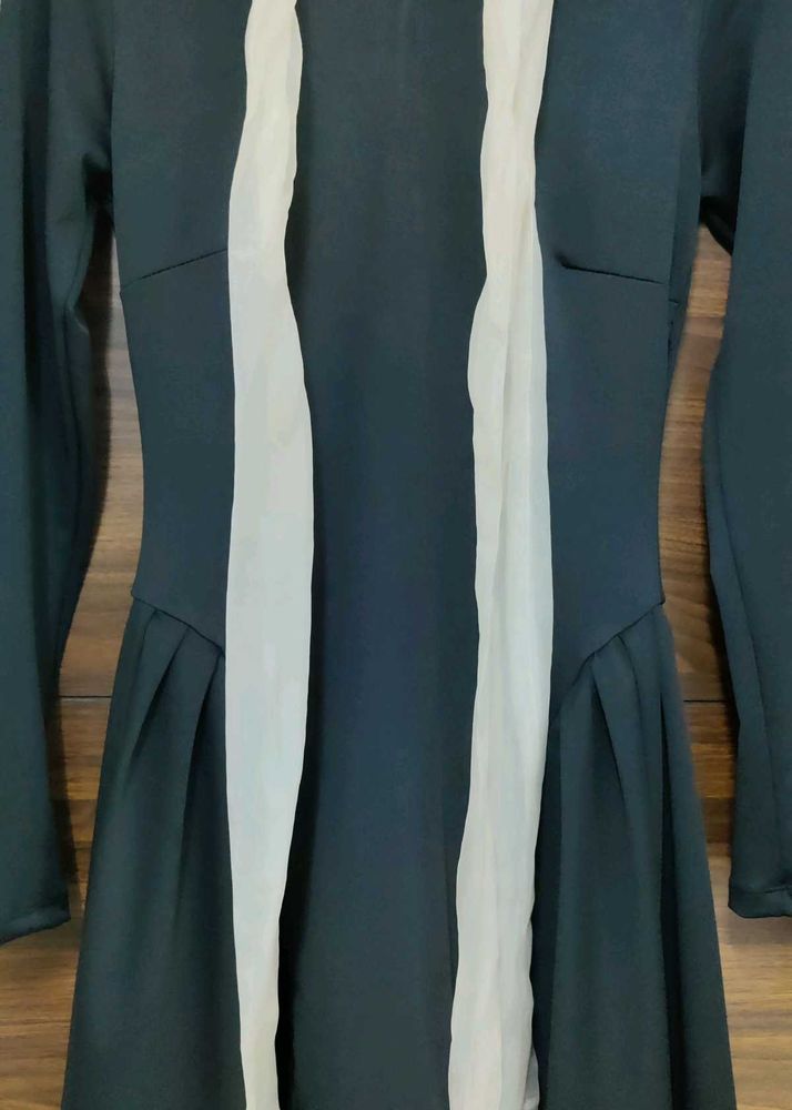 High Neck Solid Knotted Ruffle Hem Mini Dress