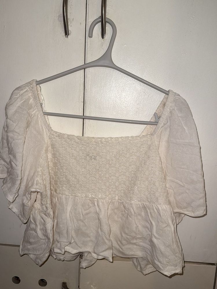 Cream Smocked Peplum Top