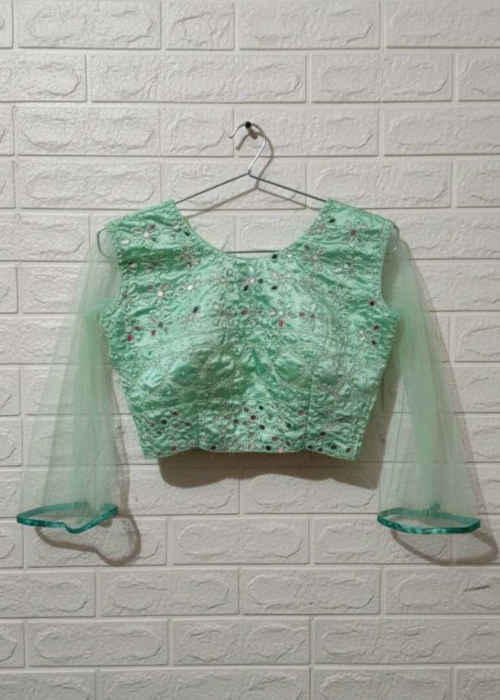 Stunning Pastel Green Mirror Work Lehenga Set