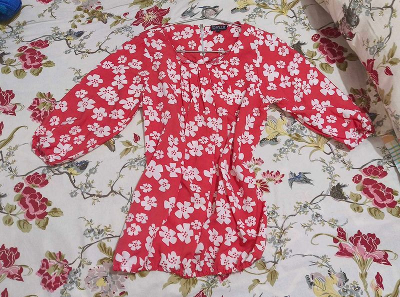 Red Top With Floral Design