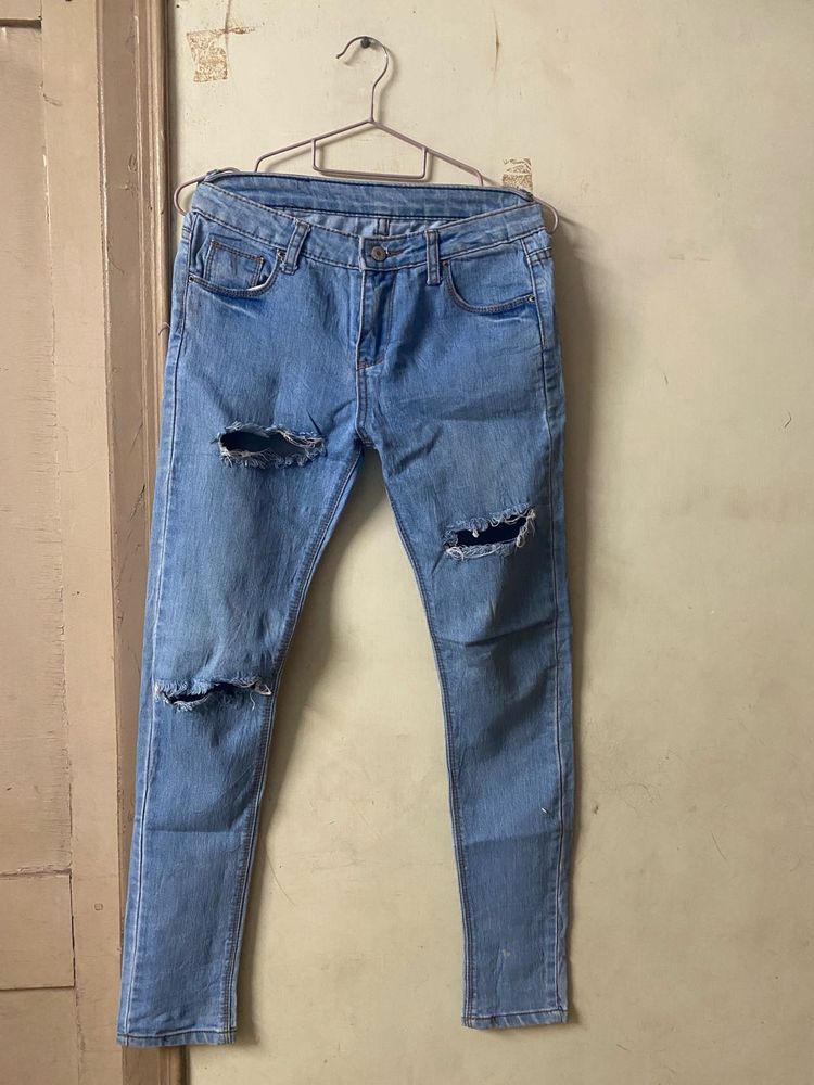 Ripped Knee Skinny Jeans