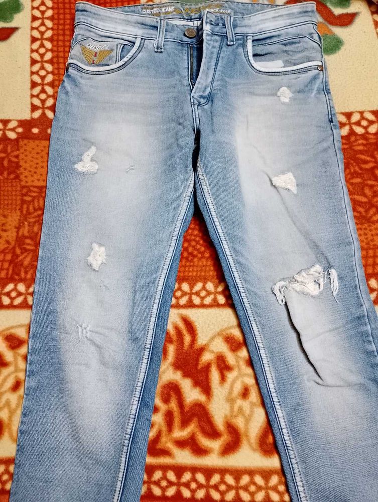 Distressed Denim Jeans