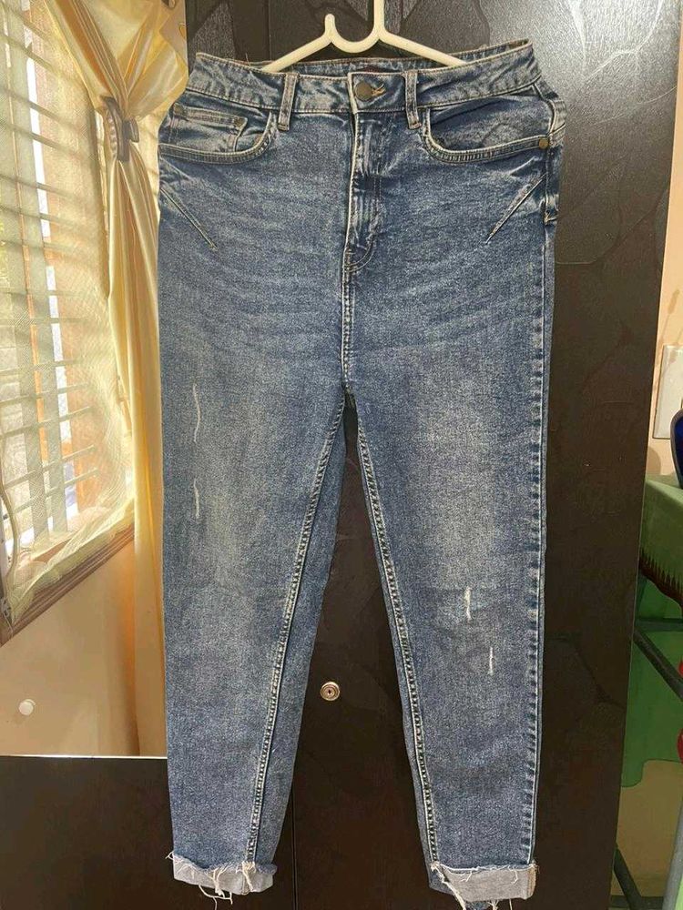 Distressed Denim Jeans