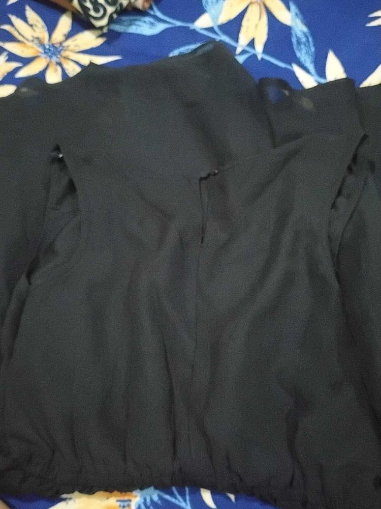 a black mini dress