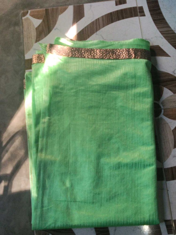 Green Saree with Gold Border