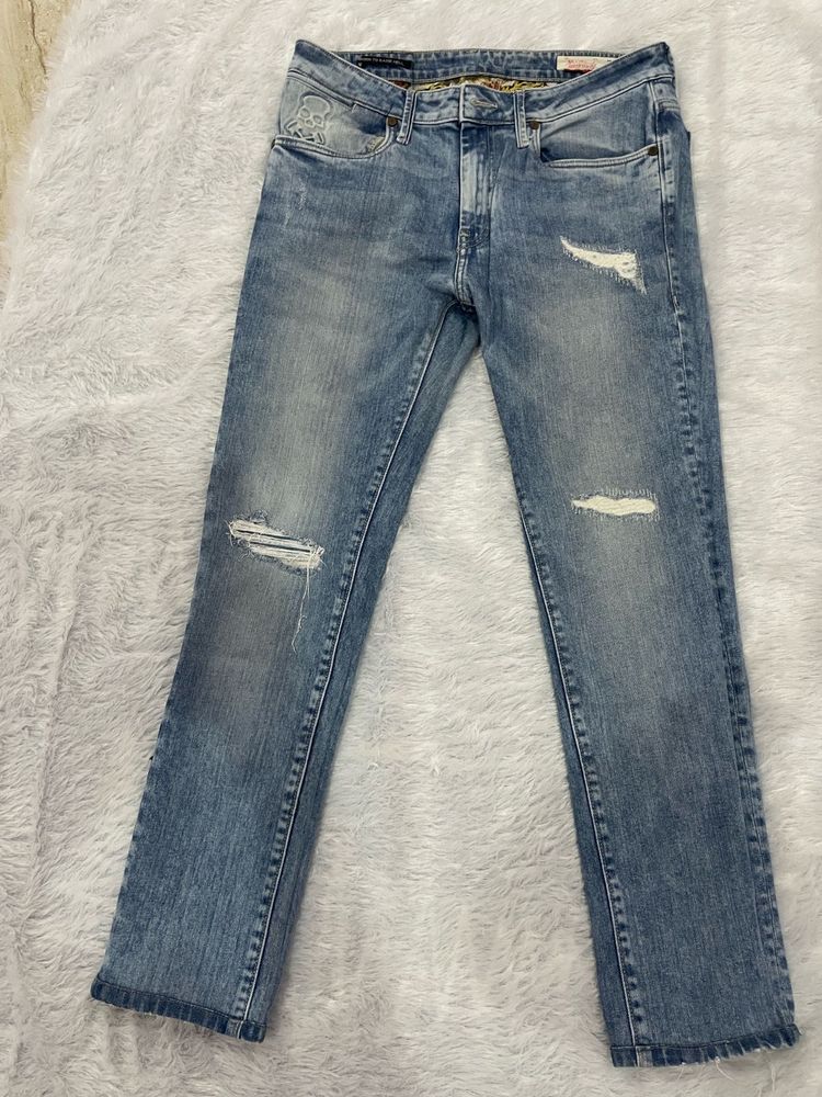 Distressed Denim Jeans