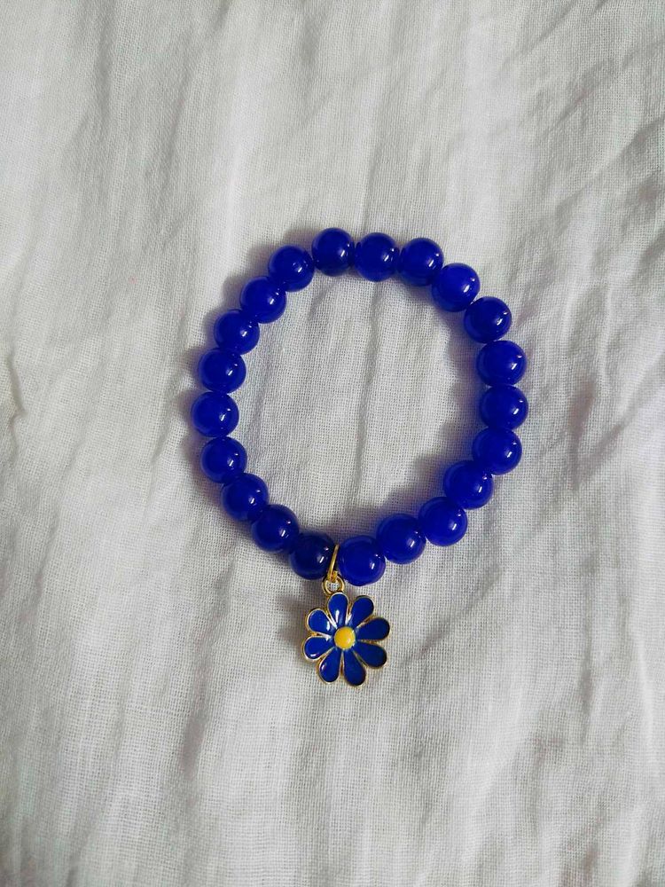 Blue Beaded Bracelet with Flower Charm