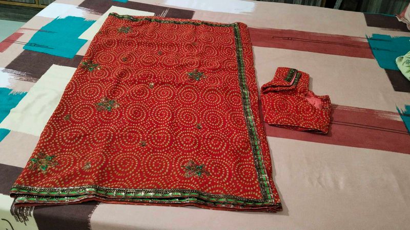 Red Embroidered Saree with stitch Blouse