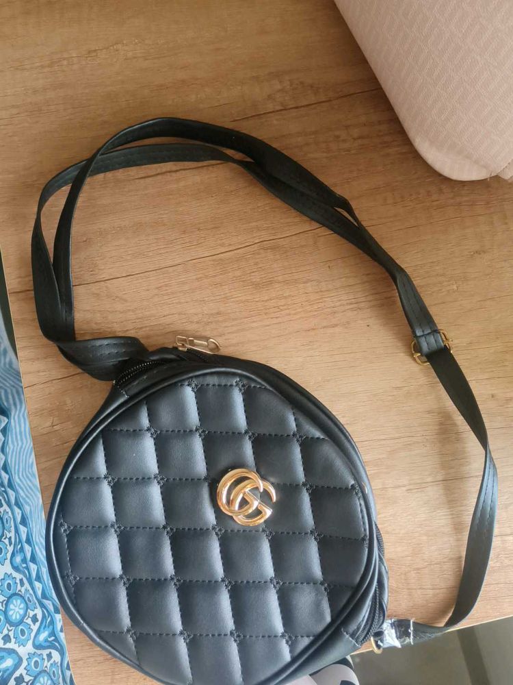 Quilted Circle Sling Bag