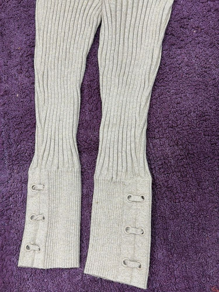 Gold–beige shimmer top.