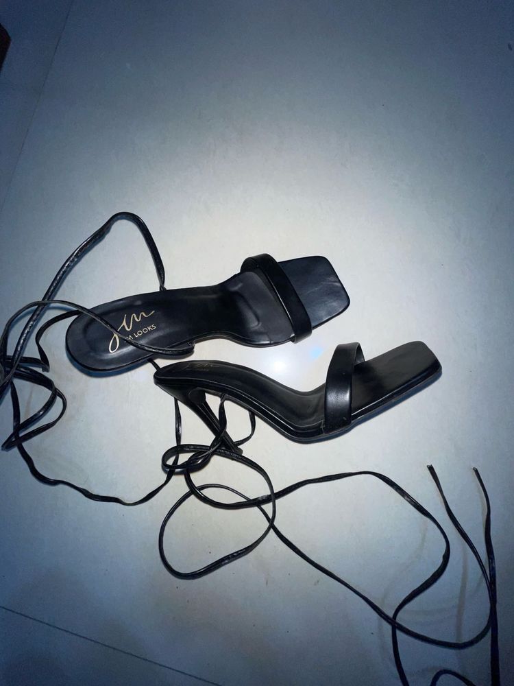 Black High Heels With Laces Or Strips