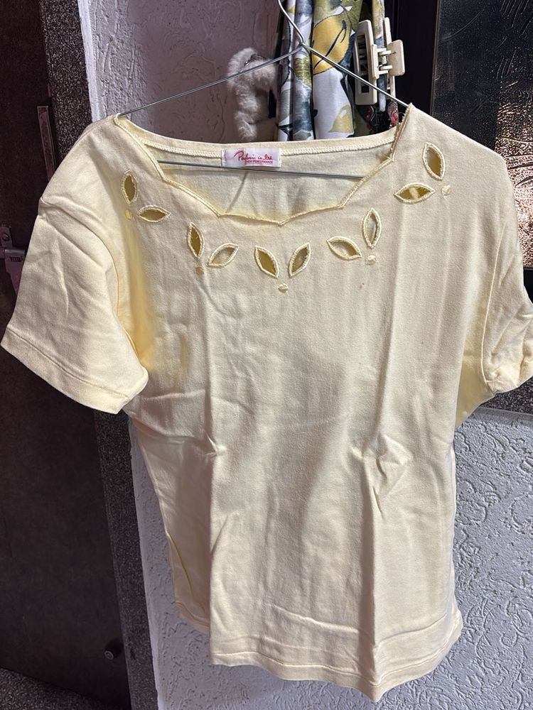 Pale Yellow Top with Cutouts