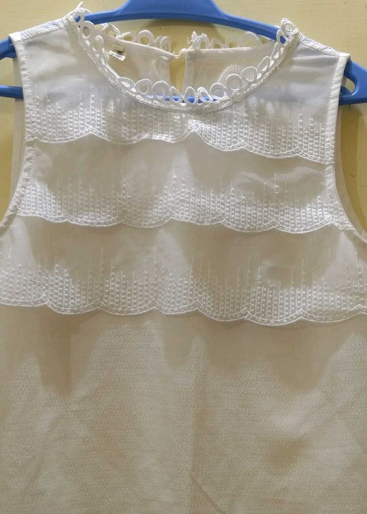 White Sleeveless Top