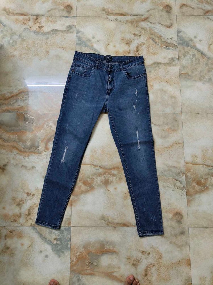 Distressed Denim Jeans