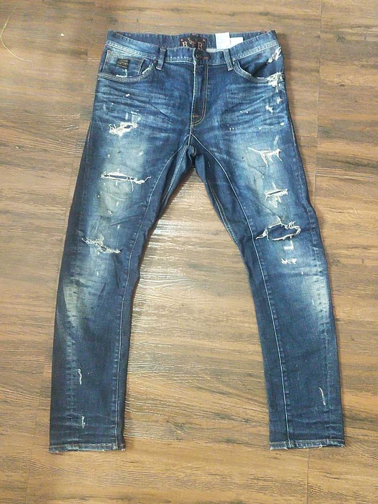 Distressed Denim Jeans