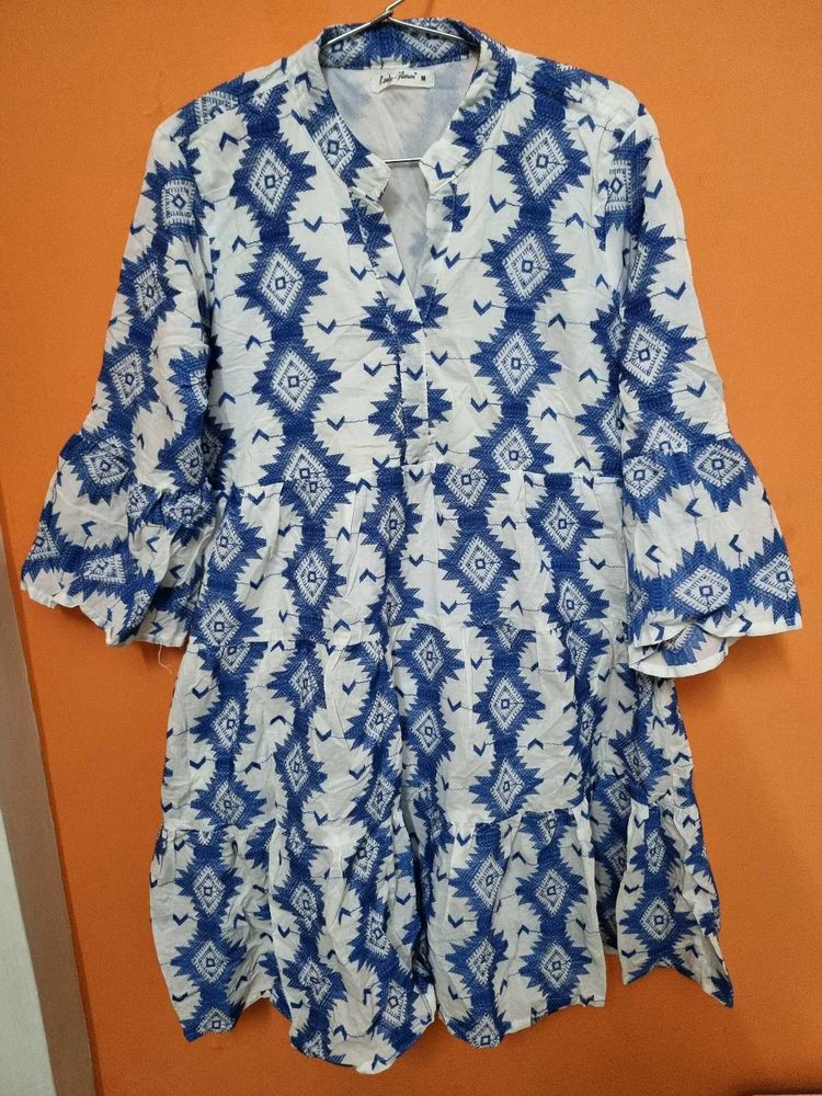 White Knee-Length One-Piece with Blue Embroidery
