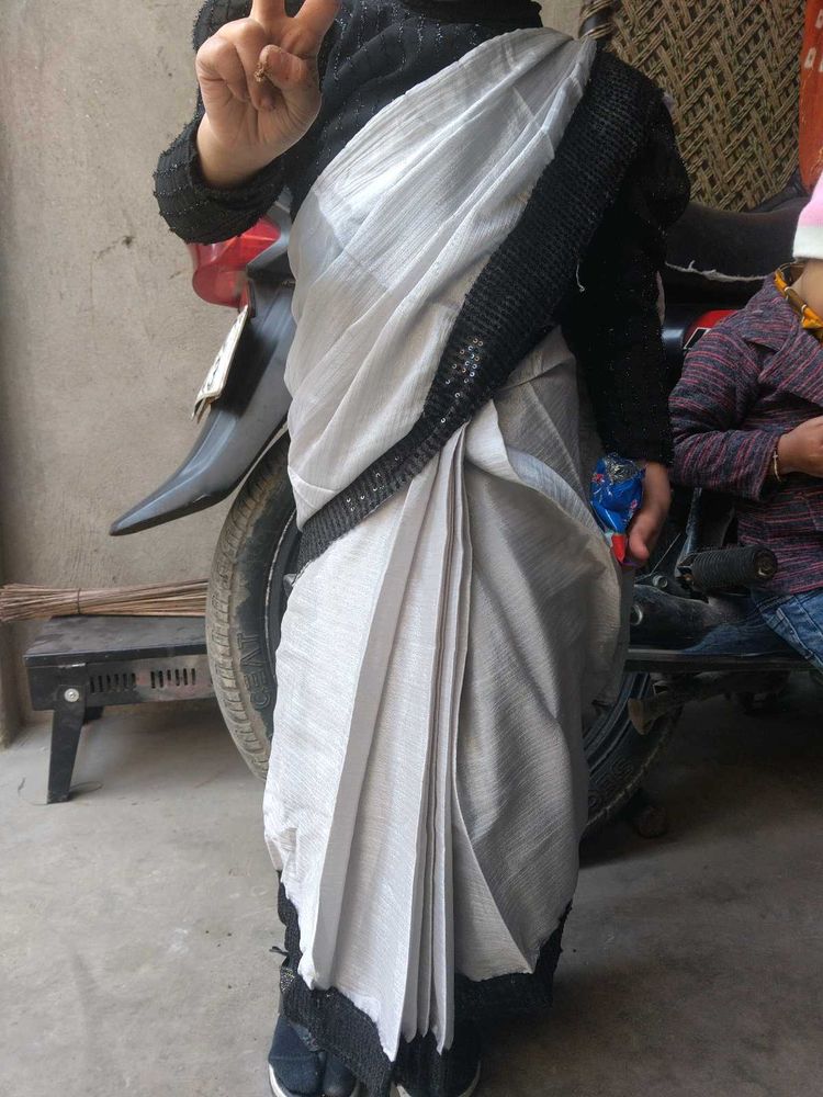 Elegant Silver Saree with Black Border