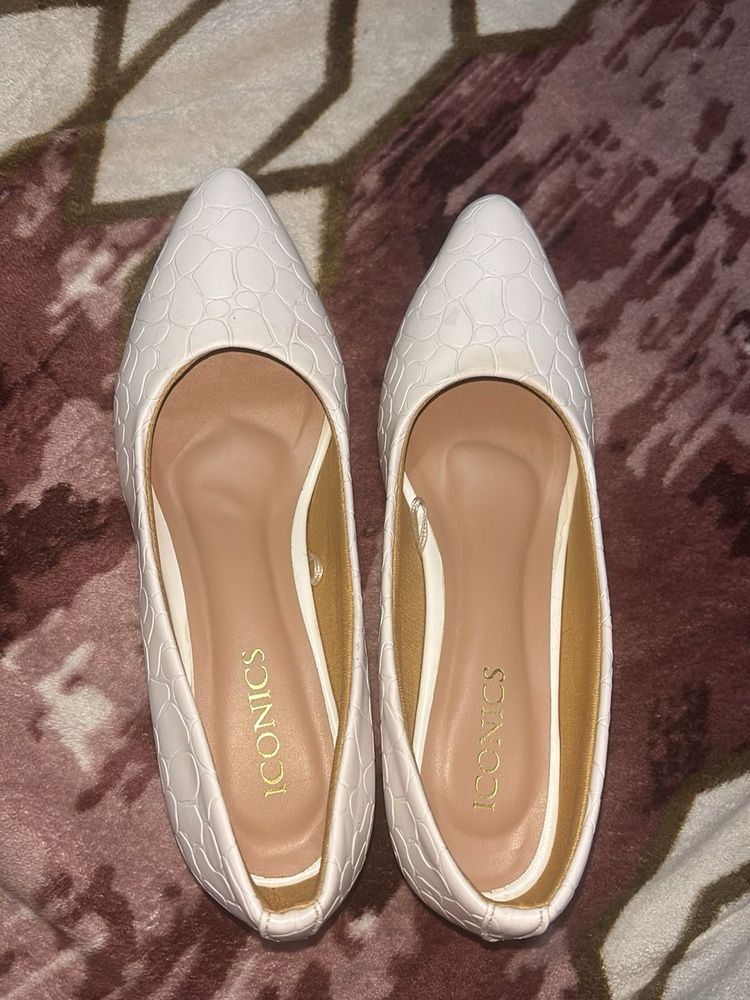 Iconic White Ballerinas