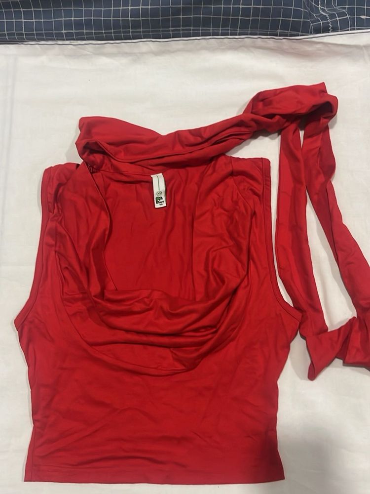 a red drape top