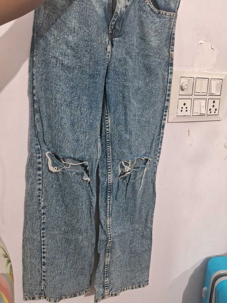 Ripped Knee Jeans