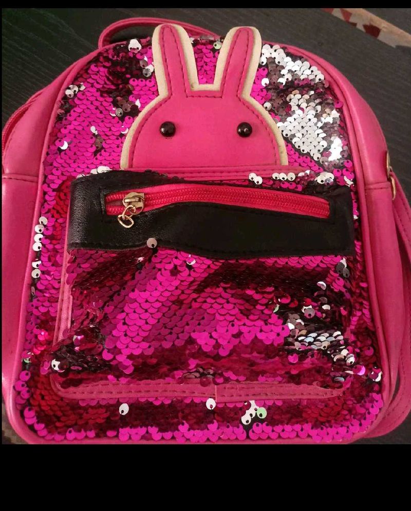 magenta sequin bag