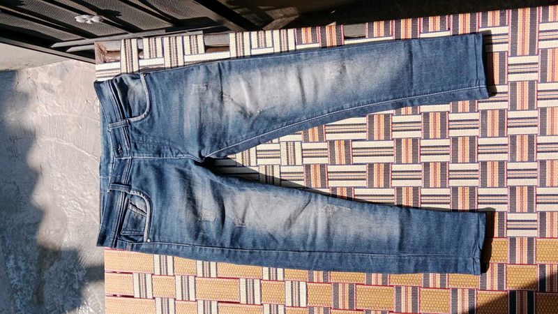 Distressed Denim Jeans