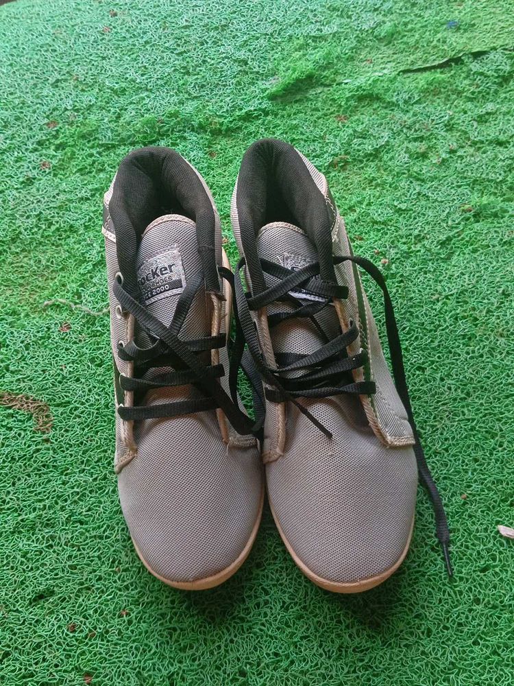 Man And Woman Sports Shoes