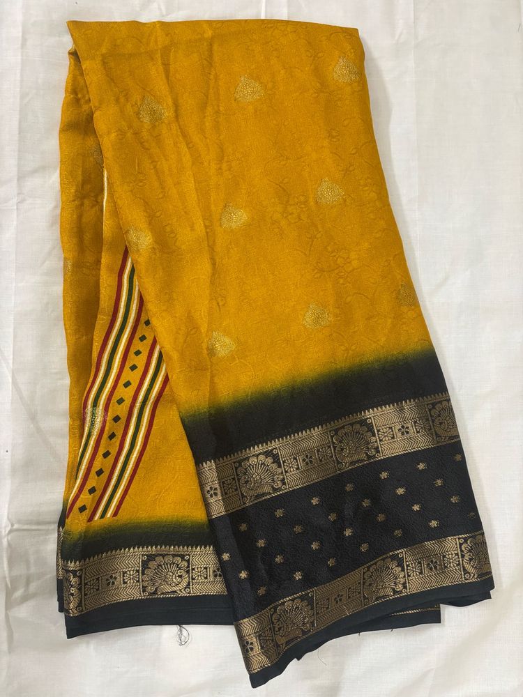Elegant Yellow Saree with Black Border