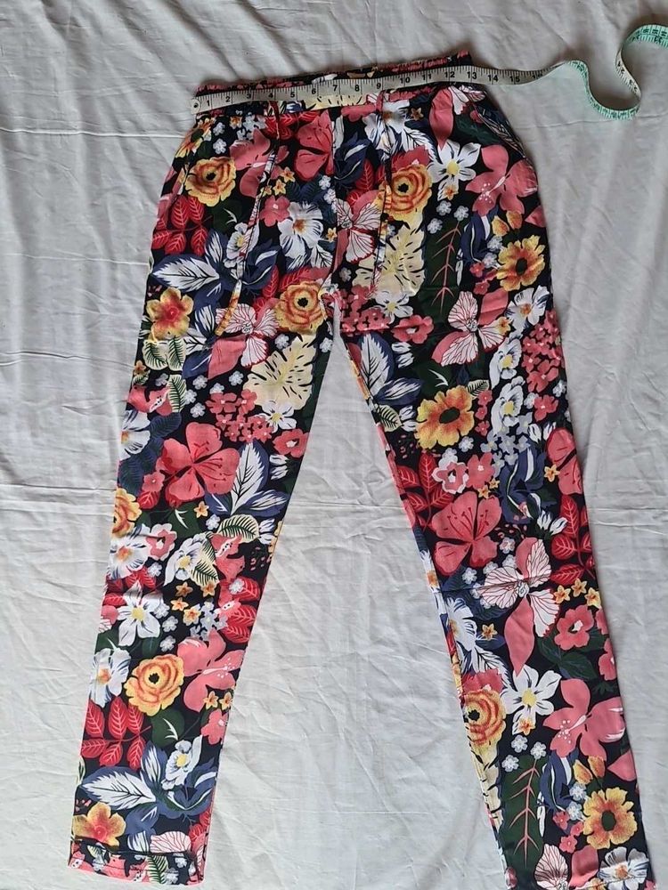 Straight Pant Floral Print On Black Base.