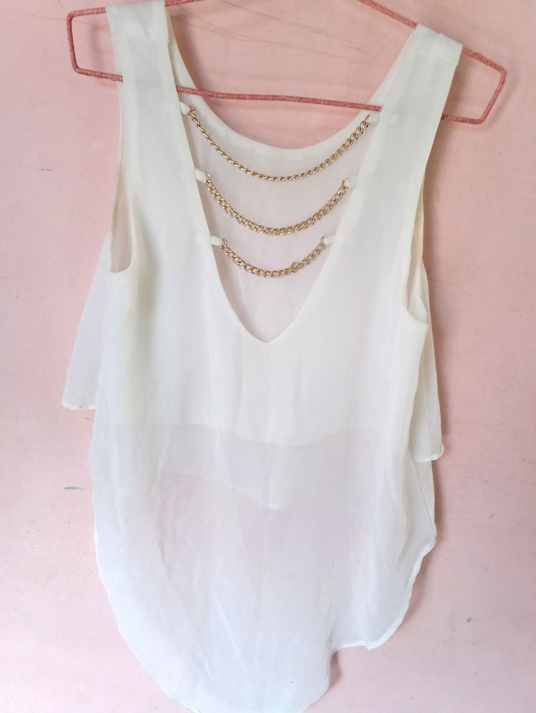 Styling White Top With Golden Back Chains