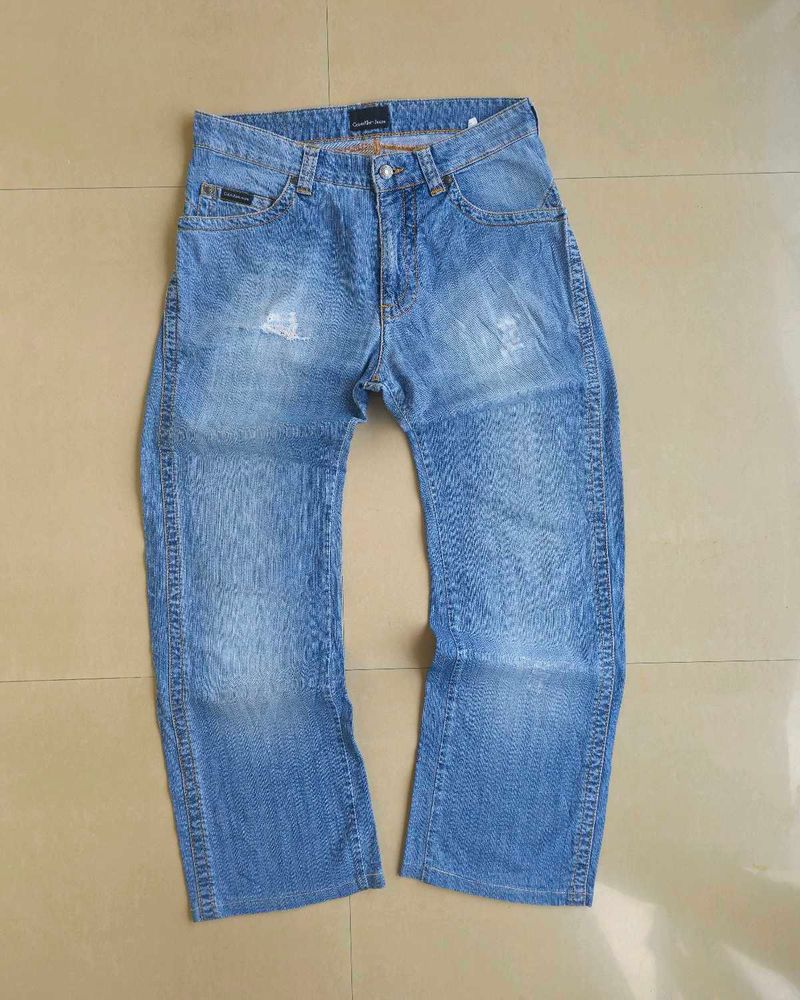 Calvin Klein Light Blue Denim | Waist 34in | Vinta