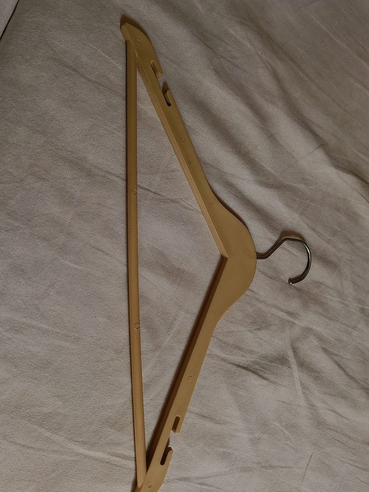 10 wooden look plastic hanger