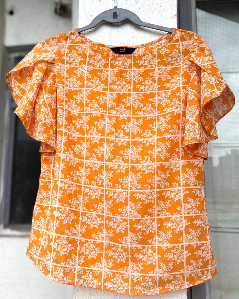 Zink Orange Floral Ruffle Top