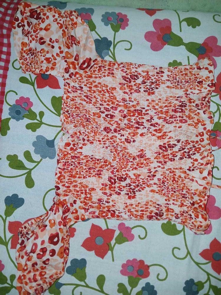 Orange Animal Print Smocked Top