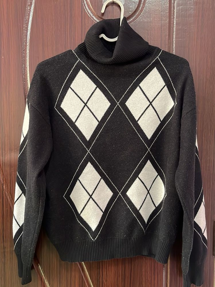 Turtleneck jumper dopped shoulder